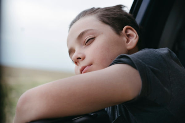 Boy in a vehicle